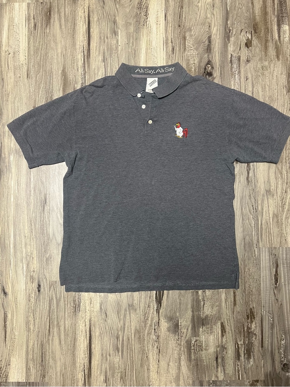 Men's Dark Gray Polo with Embroidered Looney Toons Foghorn Leghorn Image